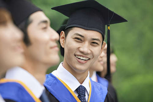 Happy graduate during graduation ceremony