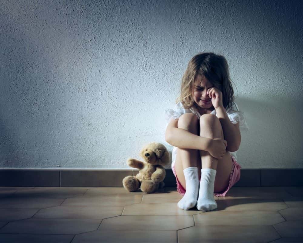 HFC Complex PTSD 1 A little girl sits on the floor and cries