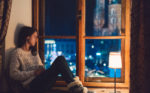 relaxed-woman-sitting-at-the-window-sill-and-drinking-tea-stockpack-gettyimages Relaxed woman sitting at the window sill and drinking tea