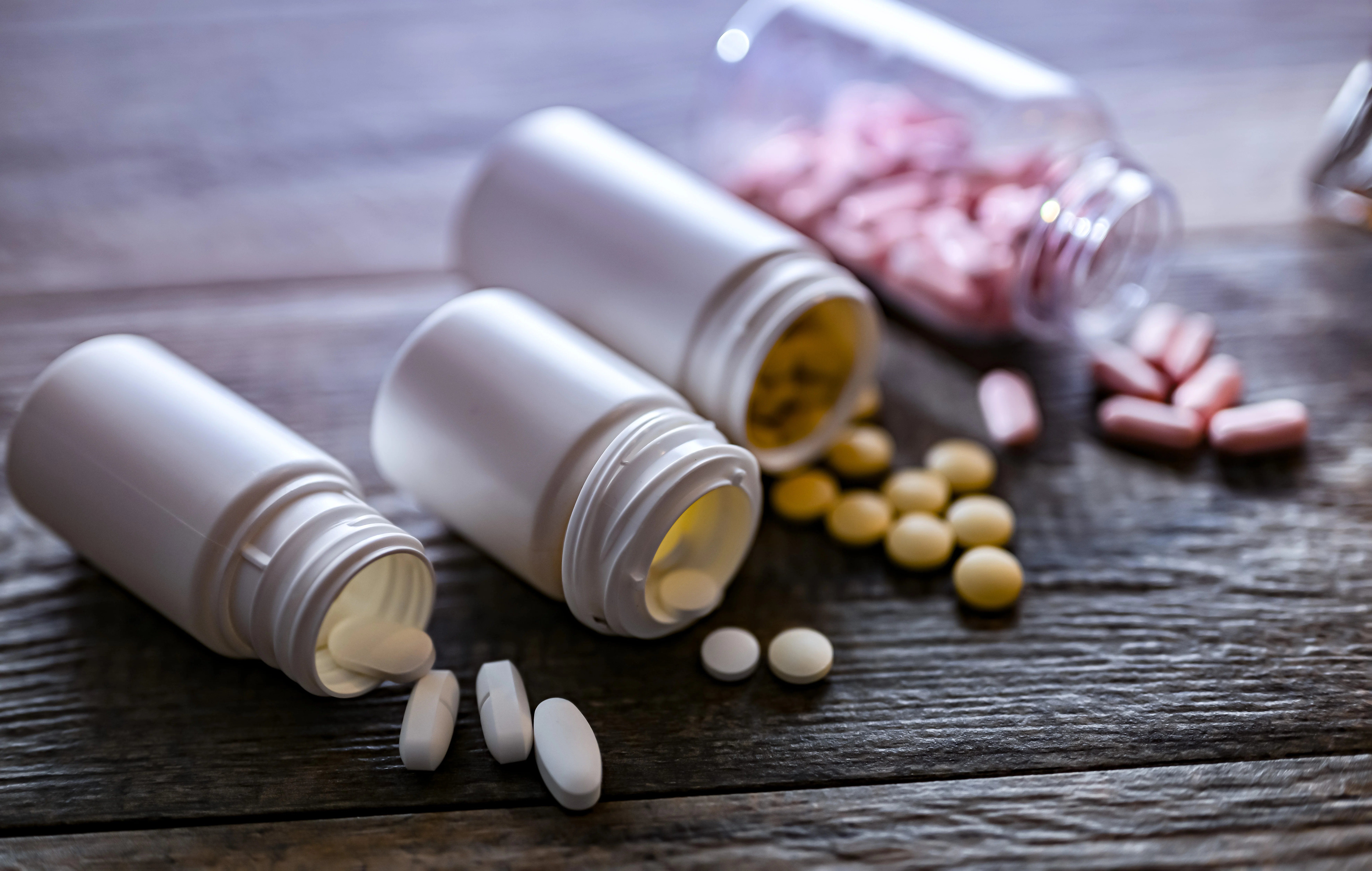 Containers with pills. Addictive substances.