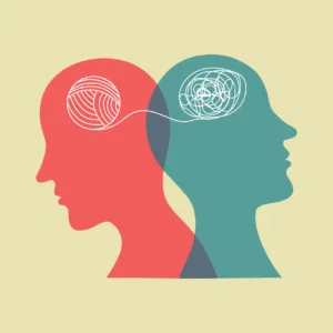 Illustration of two heads back to back with brain in form of entangled yarn thread representing cognitive dissonance