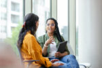 Therapy client listens to therapist discuss coping strategy Therapist discussing the difference between Ativan and Xanax with her client