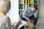man-with-psychologist-theraphy-stockpack-gettyimages Man with psychologist theraphy