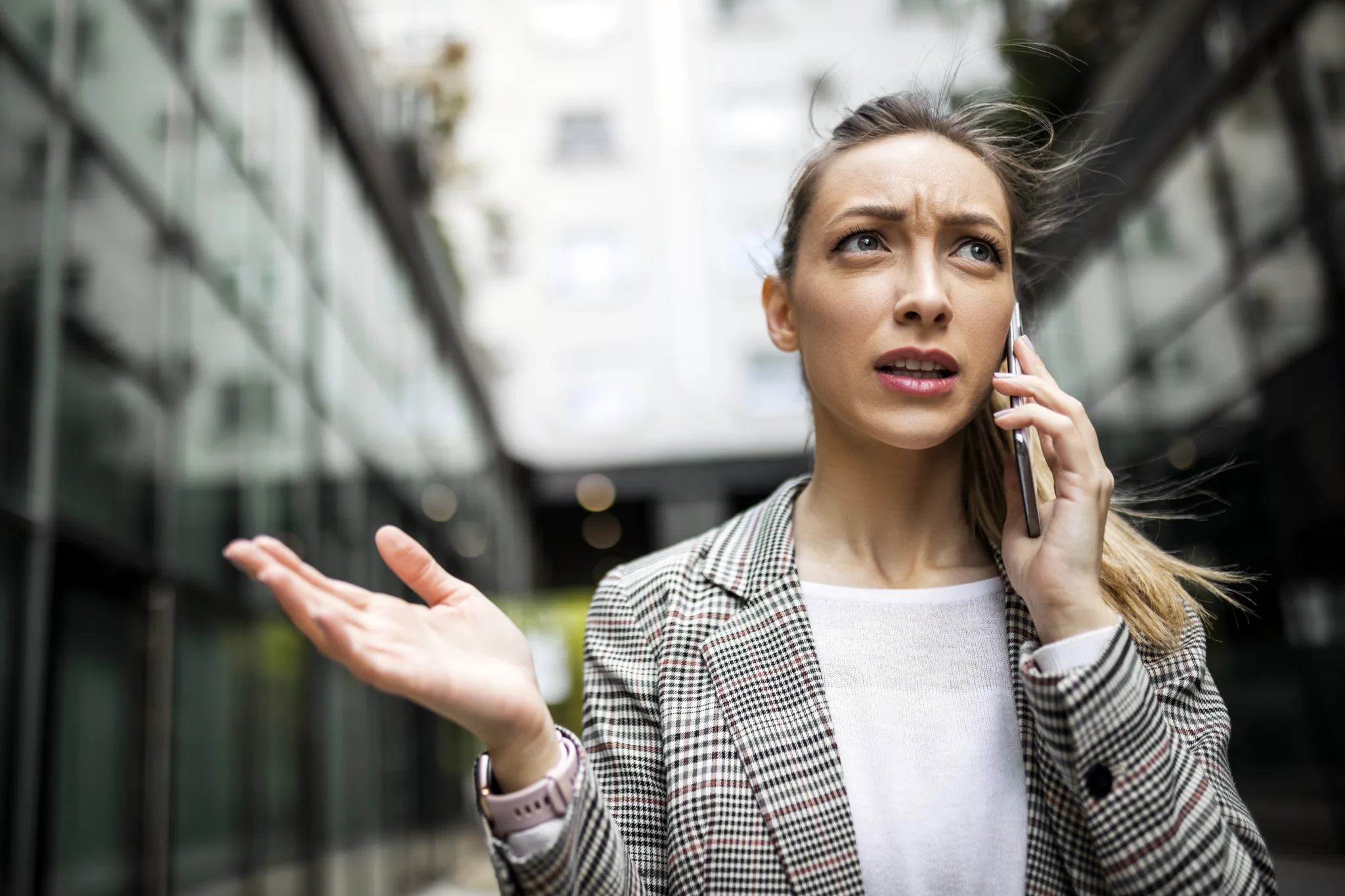 complaining businesswoman using phone